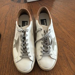 Golden Goose white sneakers..